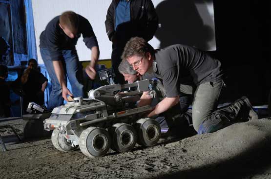 John Lee and the team working on a lunar rover miniature for Moon